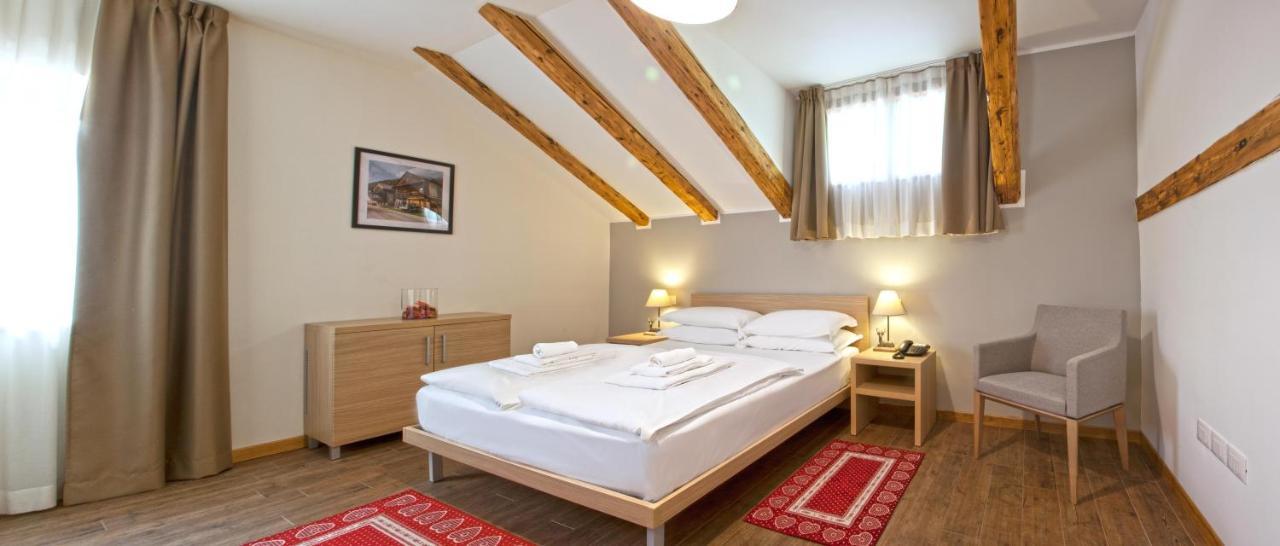 Residence Cavanis Wellness & Spa Sappada Pokoj fotografie